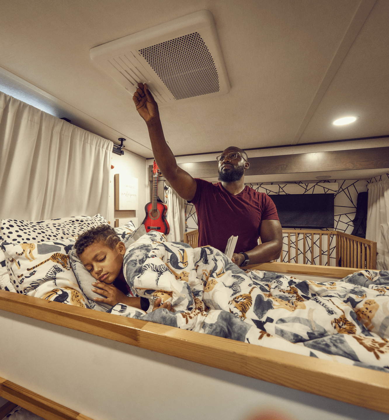 child sleeping in air conditioned RV