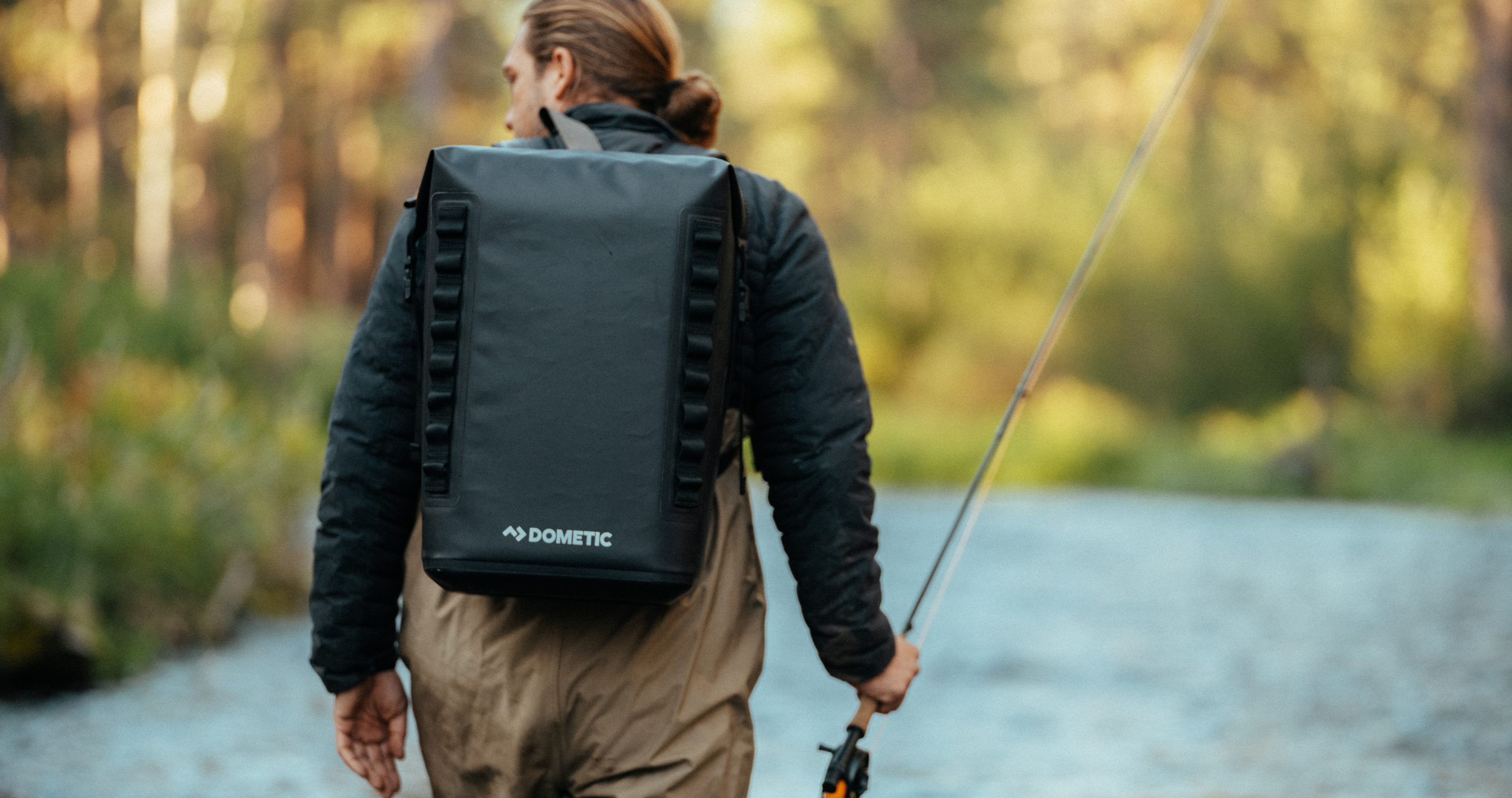 Man fishing with the dometic PSC soft cooler.